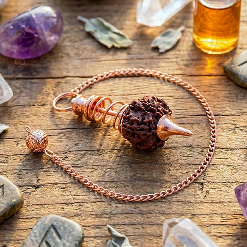 Pendulo com Semente de Rudraksha, banhado a cobre, COM ESPIRAL, 500px